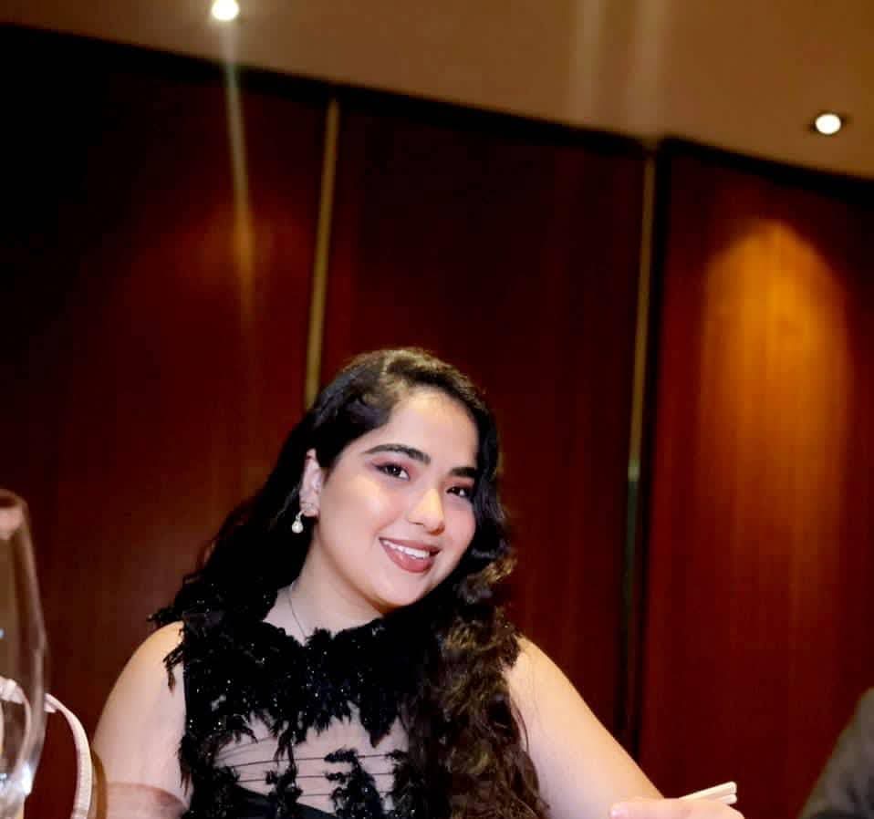 Falguni Meghrajani smiling at a celebration dinner