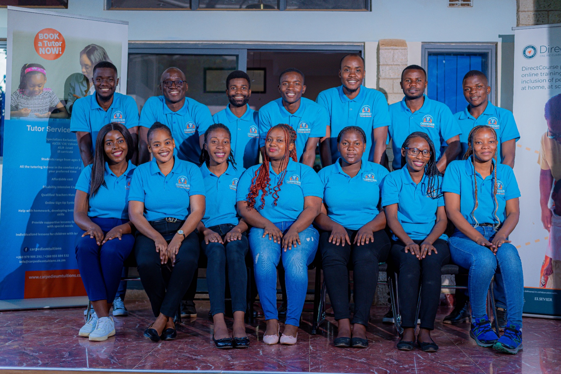 Carpe Diem team group photo seated and standing